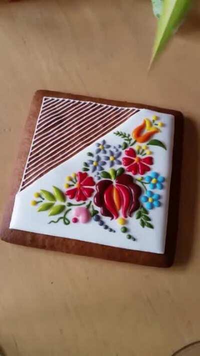 Beautiful embroidery style icing on a cookie