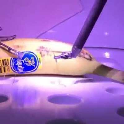 Surgeon in London performing remote operation on a banana in California-