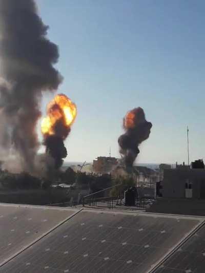 Local Palestinians film IDF strike on the branch of internal security of Hamas in Rafah, southern Gaza, a short while ago (13/5/2021)