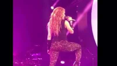 Shakira doing her thing, going off