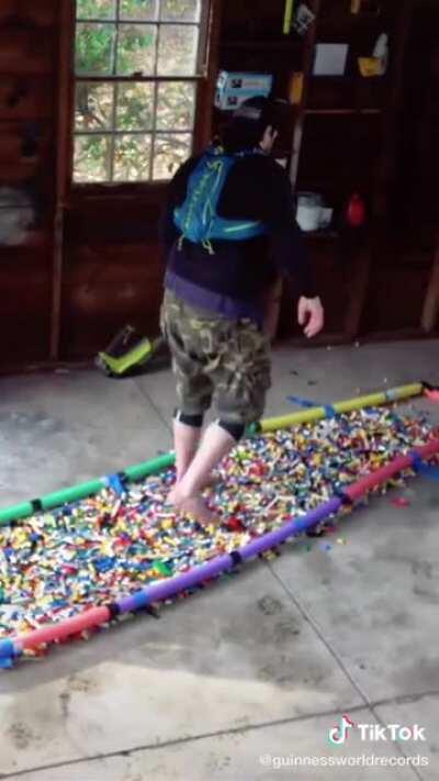 The guinnes world record for walking on legos barefoot is 3886m