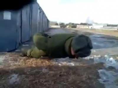 Russian soldier performs No-hand push-ups