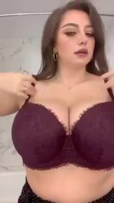 Her boobs get bigger each time she takes off a layer