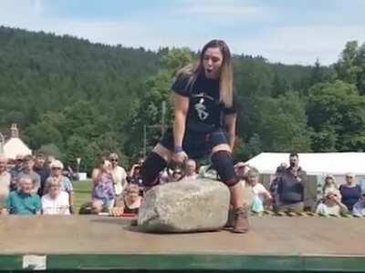 Leigh Holland-Keen lifting the legendary 733-pound Dinnie Stones, second woman ever to do so