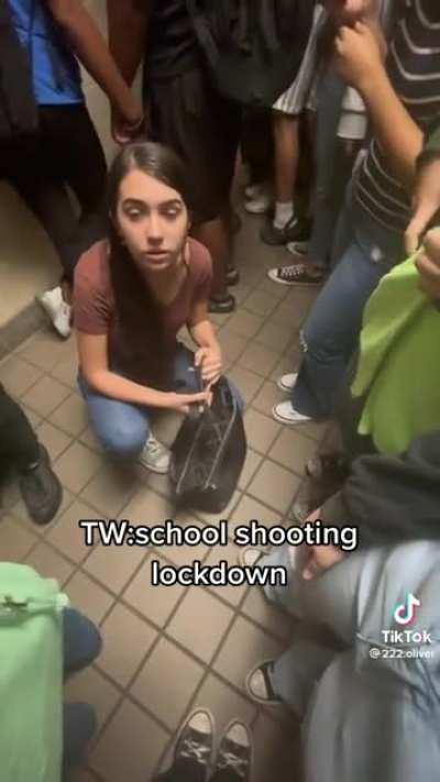 North Fort Myers High School students climb fences in a collective panic from an active shooter alert. It's insanity that we allow our children to be put in these situations.