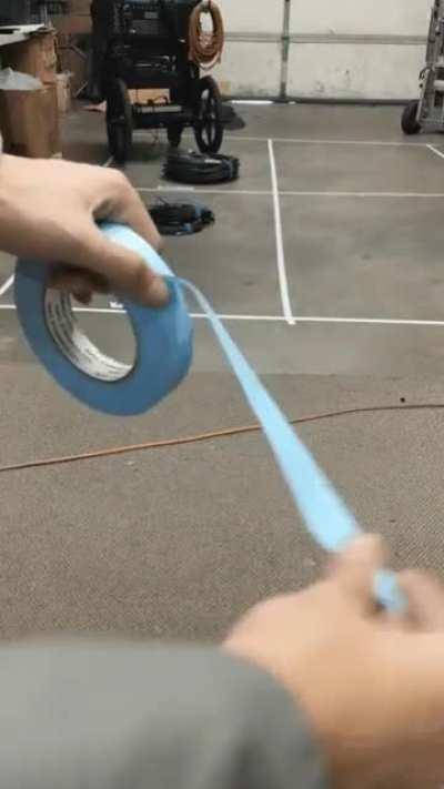 Pulling tape over to the side so you don’t have to waste time peeling it off on the next use.