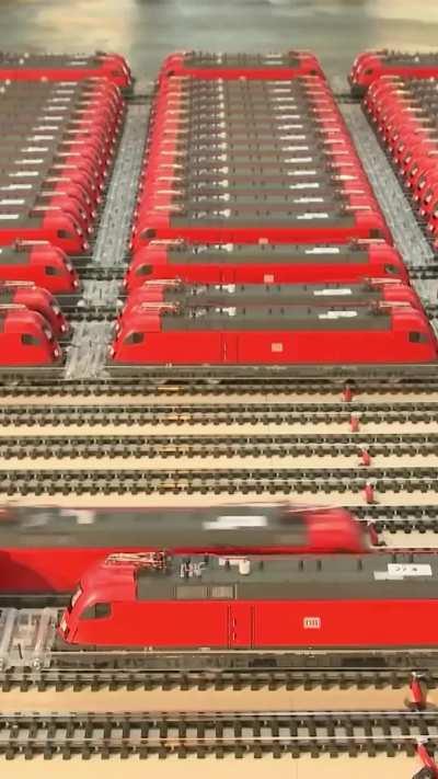 198 miniature trains pull a real train for a World Record