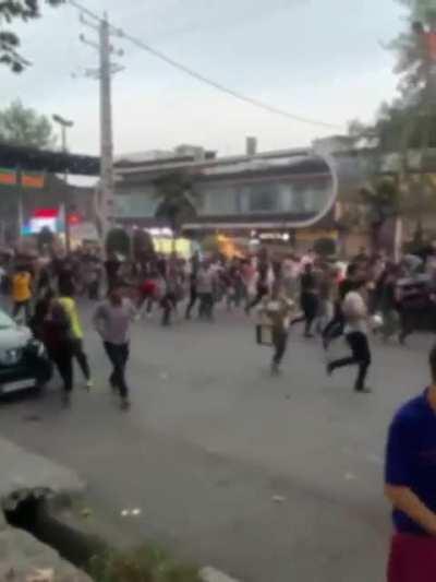 Regime is overpowered and protesters try to break into moving armoured vehicle