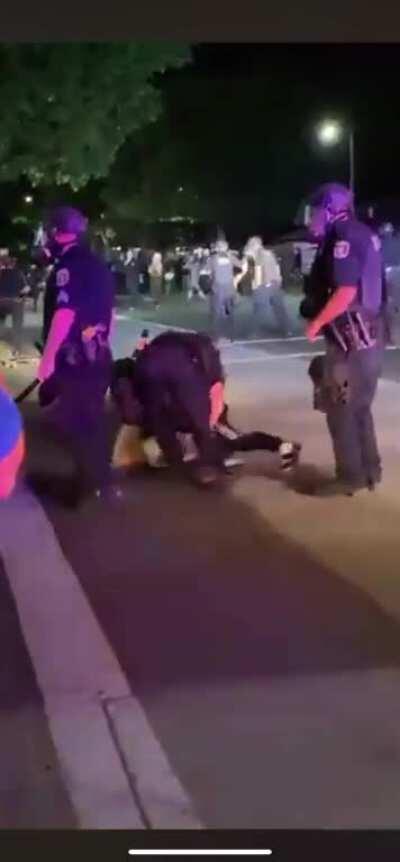 Cops violently arrest 14 y/o girl, while ignoring Proud Boy who punches a teenager right in front of them. Eugene, OR