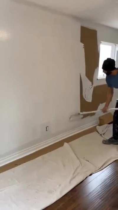 This wall being painted in about :45 seconds.