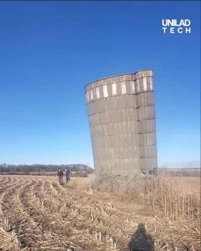 The way the silo falls after being knocked down by a sledgehammer