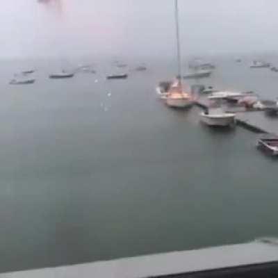 Cameraman manages to capture a boat being struck by lightning