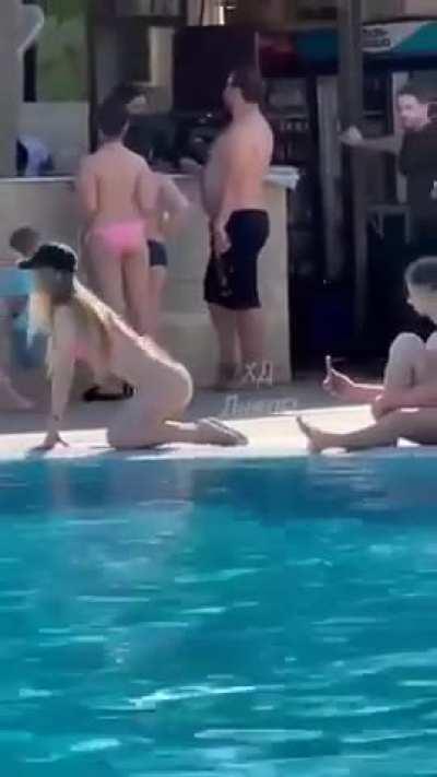 twerking for a video in a public pool.