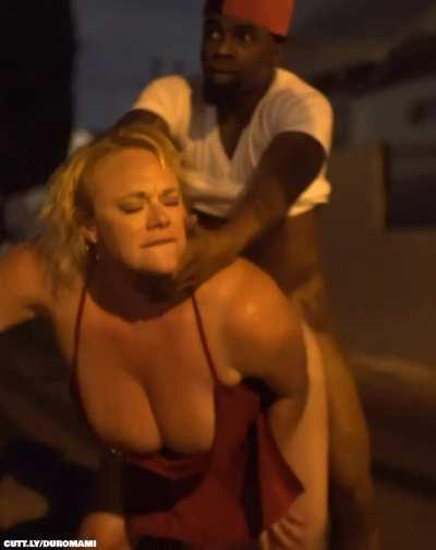 Blonde top heavy milf in a red dress can't wait and gets her cheeks clapped in public