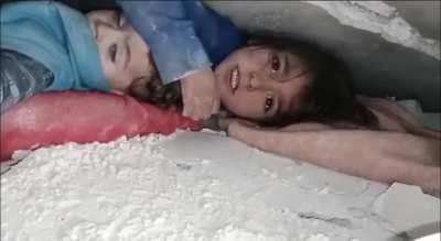 Both sisters were rescued after being stuck under the rubble for 17 hours.