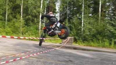 Biker showcasing a skillful 360 turn