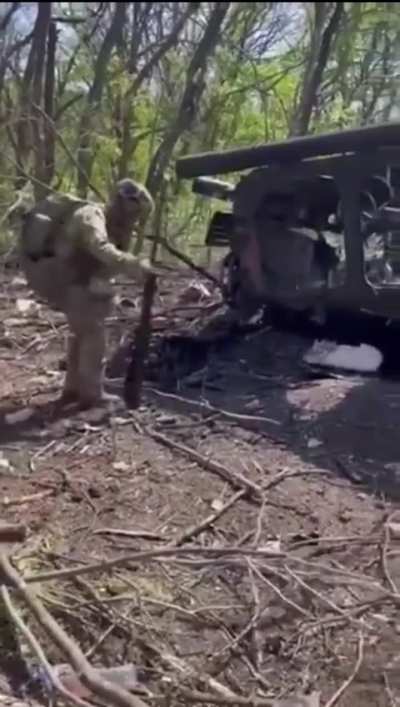 American volunteers in  Ukraine with a newly captured Russian machine gun. Summer 2024