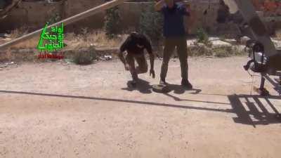 Opposition engineers build a trebuchet to launch mines converted into explosive projectiles - 5/17/2014