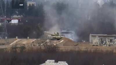 Jaysh al-Islam ATGM strike on an SAA tank as it emerges from cover - Hazrma, E. Ghouta - 2017