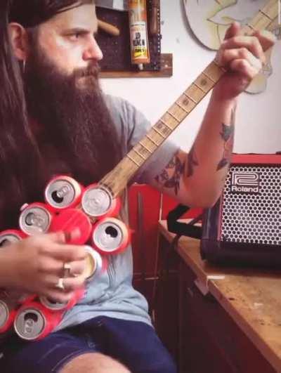 He showcased his creativity by crafting a guitar from soda cans