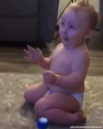 Baby hitting the most unbelievably perfect bottle flip