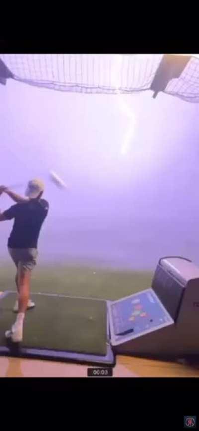 Lightning bolt hits golf ball out of the sky!