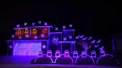 This house is extremely well-lit for Halloween, and the lighting system also syncs with music (Spooky Scary Skeleton).