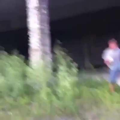 Kid throws bricks at weak highway support