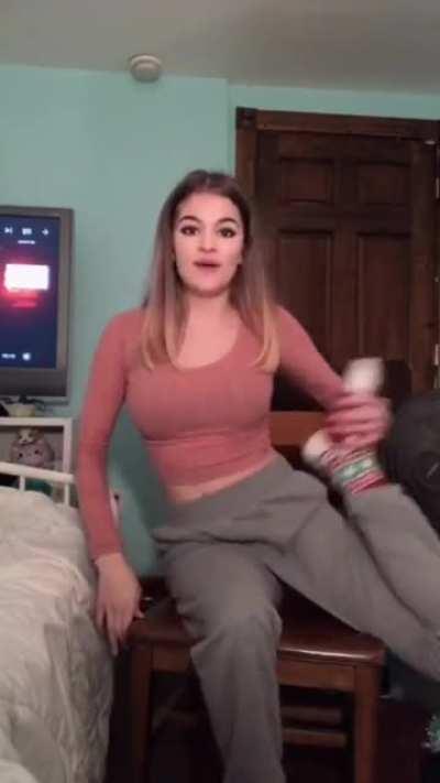 Girl demonstrates her leg bending abilities