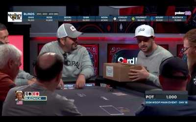 Annoying dude holds up acton for his entire table on Day 1 of the World Series of Poker to open a box of sports trading cards