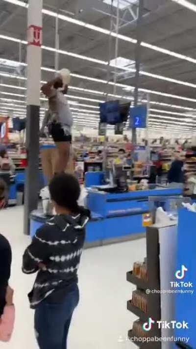 Guy goes insane and pours milk on himself, that milk goes in the bags where people’s groceries is.