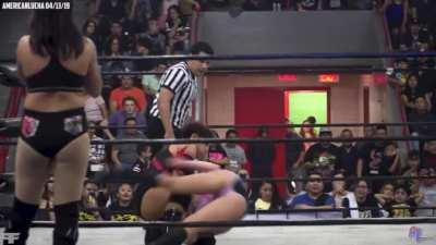 Faby Apache with a swift kick into Penelope Ford's crotch