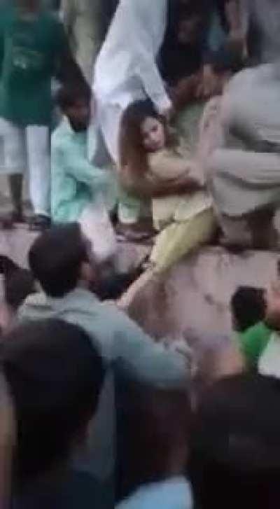Another Video of crowd harassing and molesting a girl
