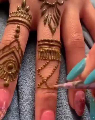 The henna pattern is impressive