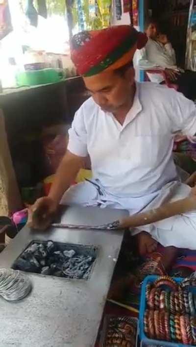 Making of bangles in Rajasthan, India (he said 200 INR that's 2.39 US$)