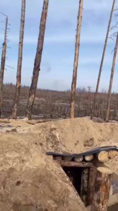 Ukrainian soldiers fire RPG/AT4 at russian positions.