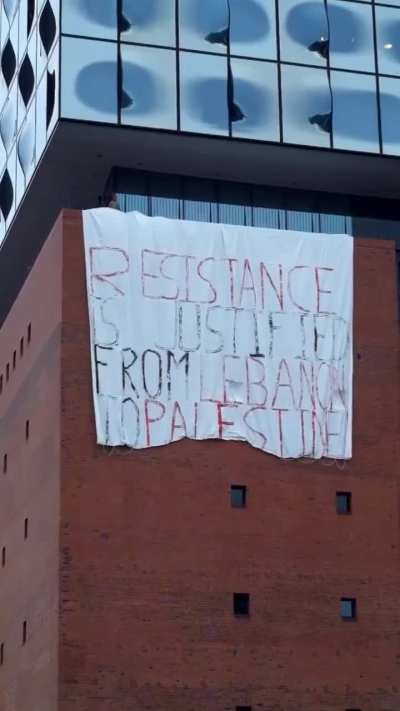 “Resistance is justified from Lebanon to Palestine”. Protesters release massive banner on Hamburg’s Philharmonie.