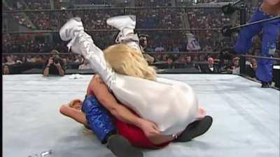 Trish Strips Torrie Wilson Leaving Her Flailing Around In Her White Panties.