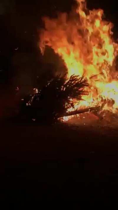 My neighbors throw what’s basically a “burn your Christmas tree” bonfire party after Christmas every year. The flames get at least 15 ft high. Thought it might fit here :)