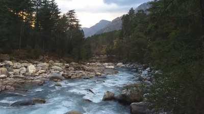 This beautiful scenic view and sound of flowing river in Parvati Valley, Kasol, India