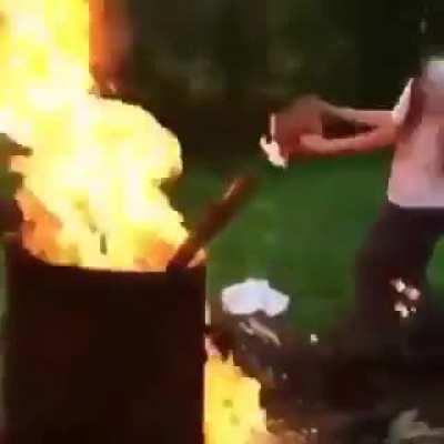 Lady catches on fire from doing something stupid