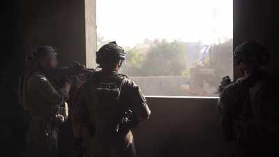 IDF soldiers using IWI [or possibly X95] Tavor assault rifles with M203 grenade & Barrett REC10 sniper rifle