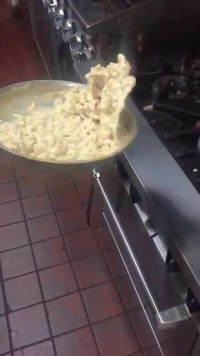 Flipping food in pan without spilling a drop