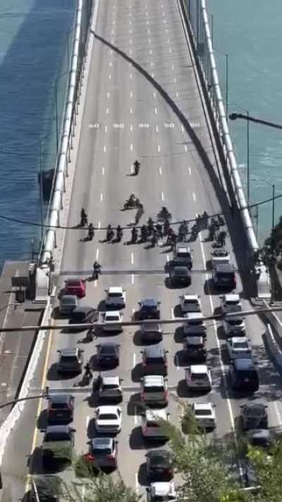 Bikers stoping the traffic to perform stunts 