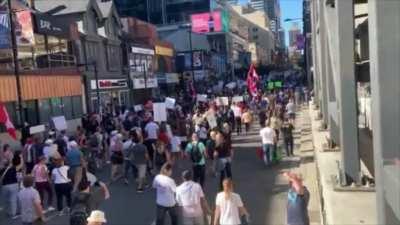 Protest against vaccine passports held in Toronto today