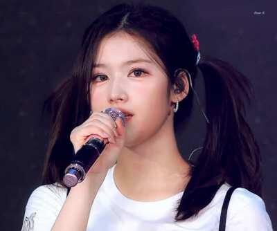 Sana - pig tails, white t-shirt