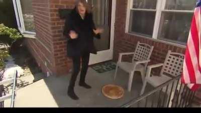 CNN reporter tries to throw 18 dollar pizza on roof.