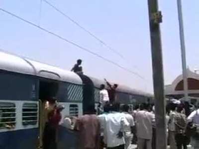 [NSFW] Man in India electrocuted atop a train