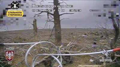 2 Russian soldiers trying to hide inside a foxhole together are taken out by an FPV kamikaze drone from the &quot;Wild Division&quot;, 82nd Air Assault Brigade