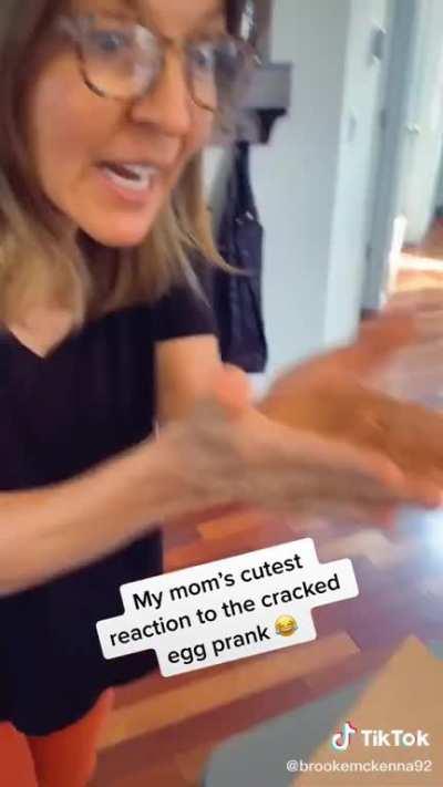 Does cracking egg prank on her mom and her mom gets way too excited.